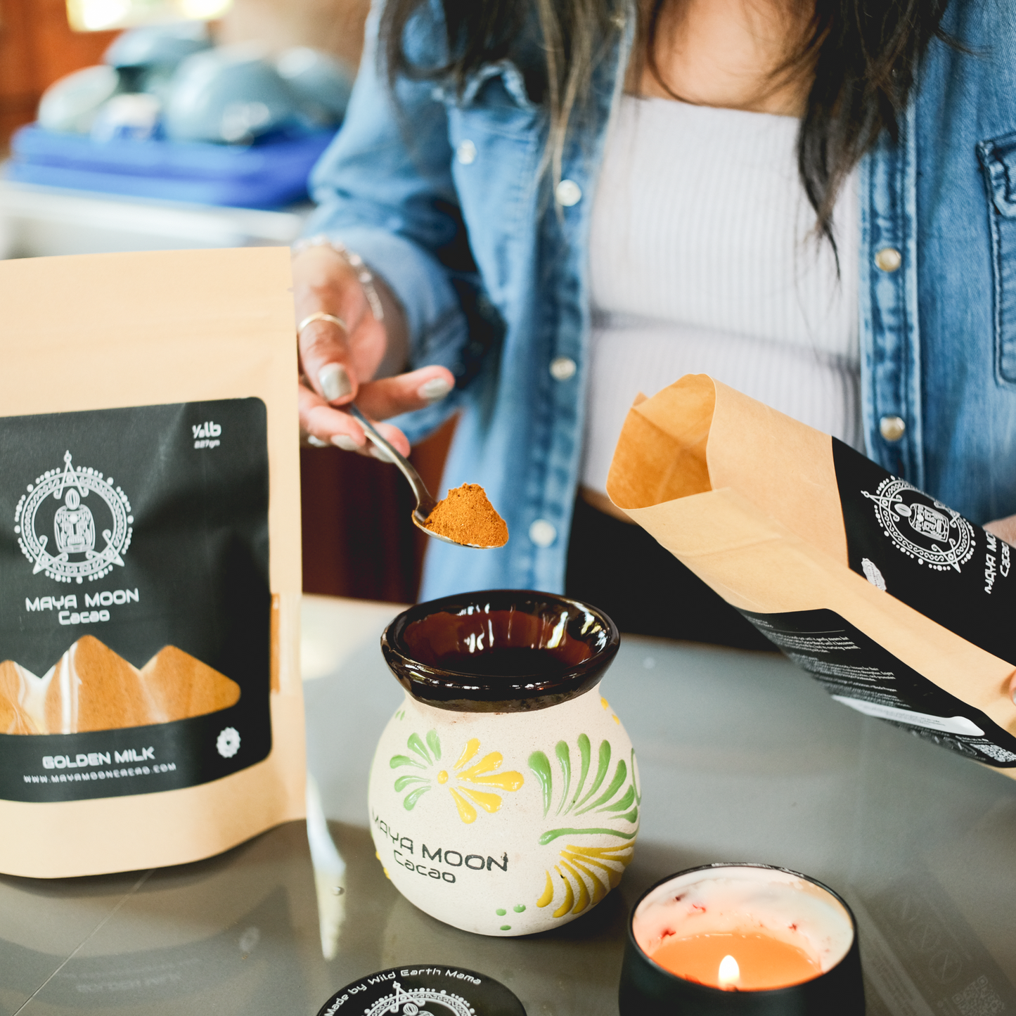 Golden Milk latte served in handmade mug with Maya Moon Golden Milk pouch – plant-based turmeric drink